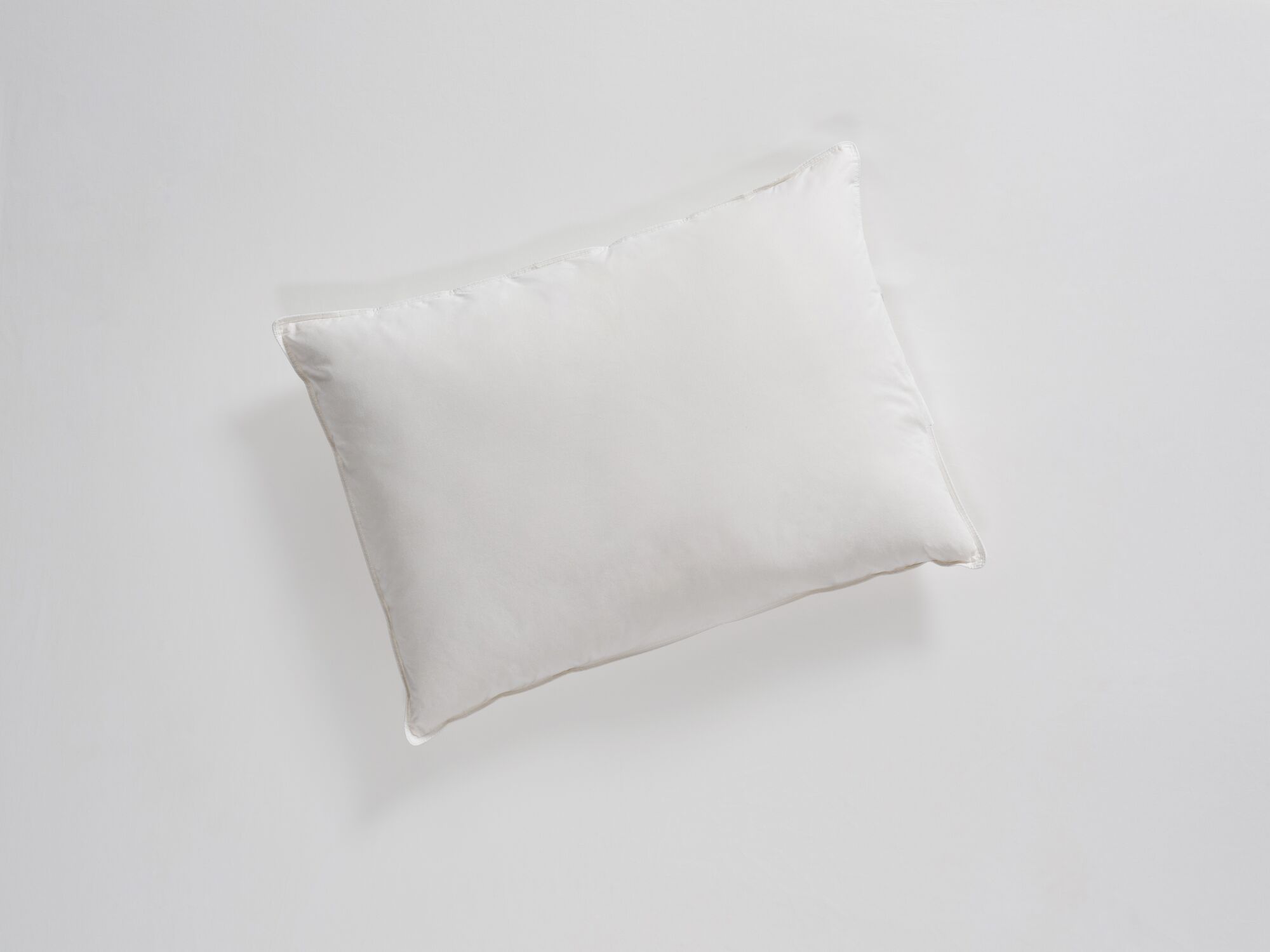 Top angle view of queen size feather pillow